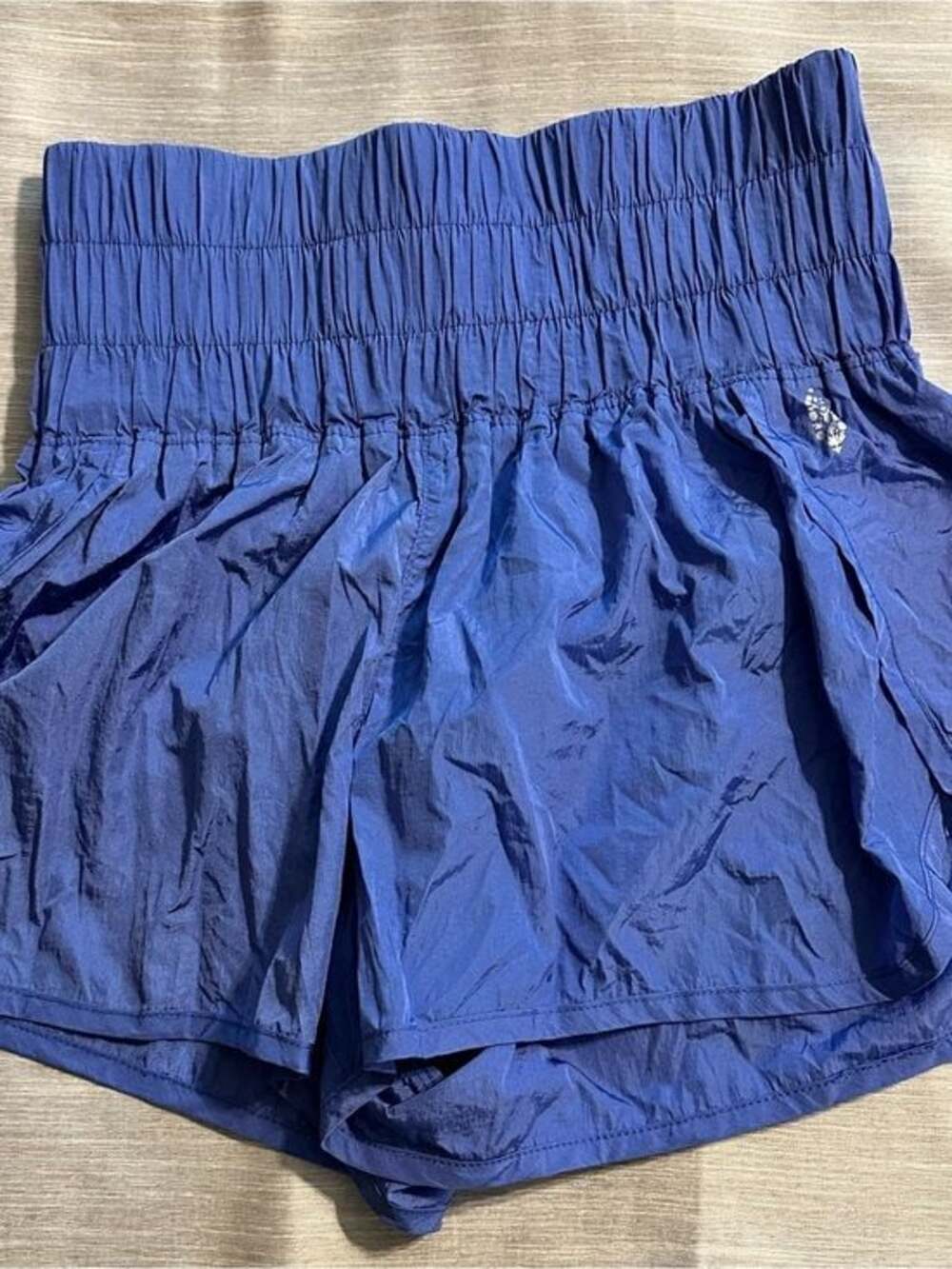 FP Movement shorts. Periwinkle/purple/bluish color. Size M.